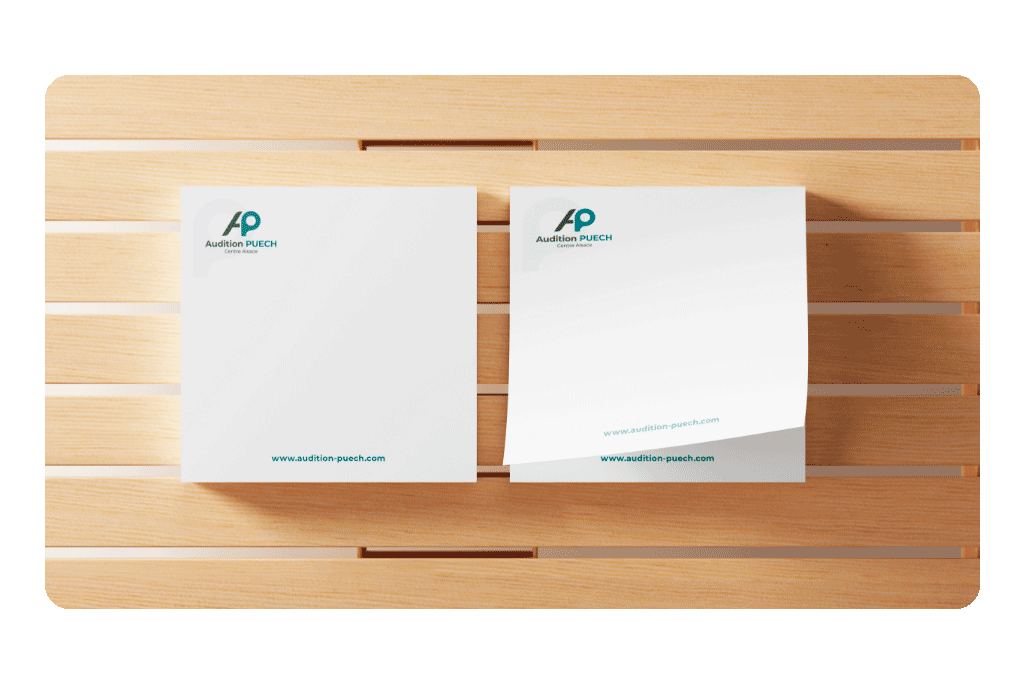 Bloc de post-it avec logo Audition Puech, support pratique et discret pour renforcer la présence de la marque